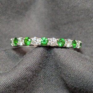 Tsavorite and diamond eternity band